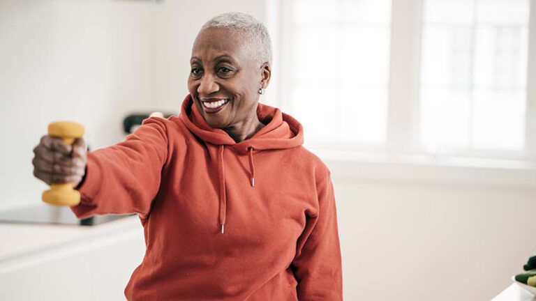Elderly Women Exercise With Hand Weights